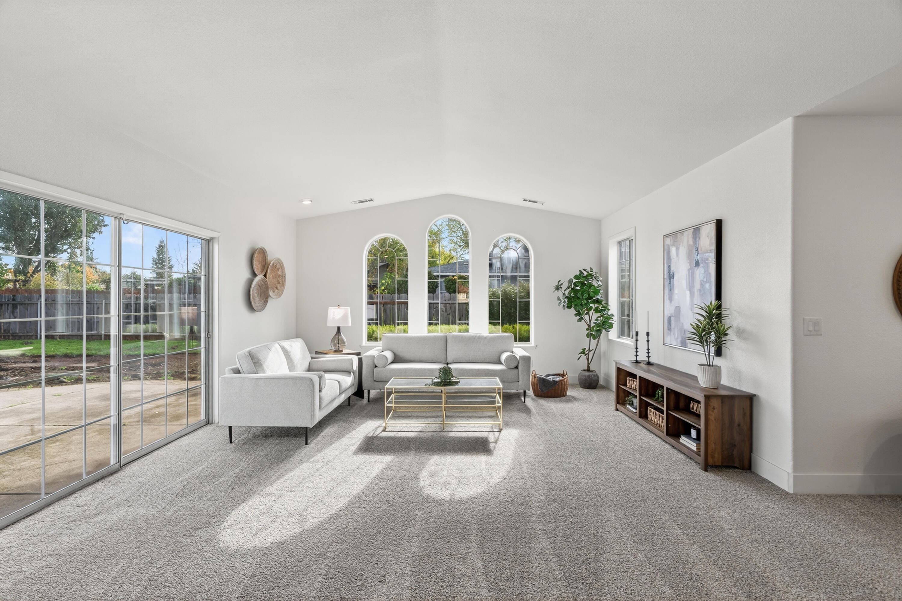 595 Rafael Street Redding, CA 96002 - Photo 11 of 54 a living room with furniture and a large window