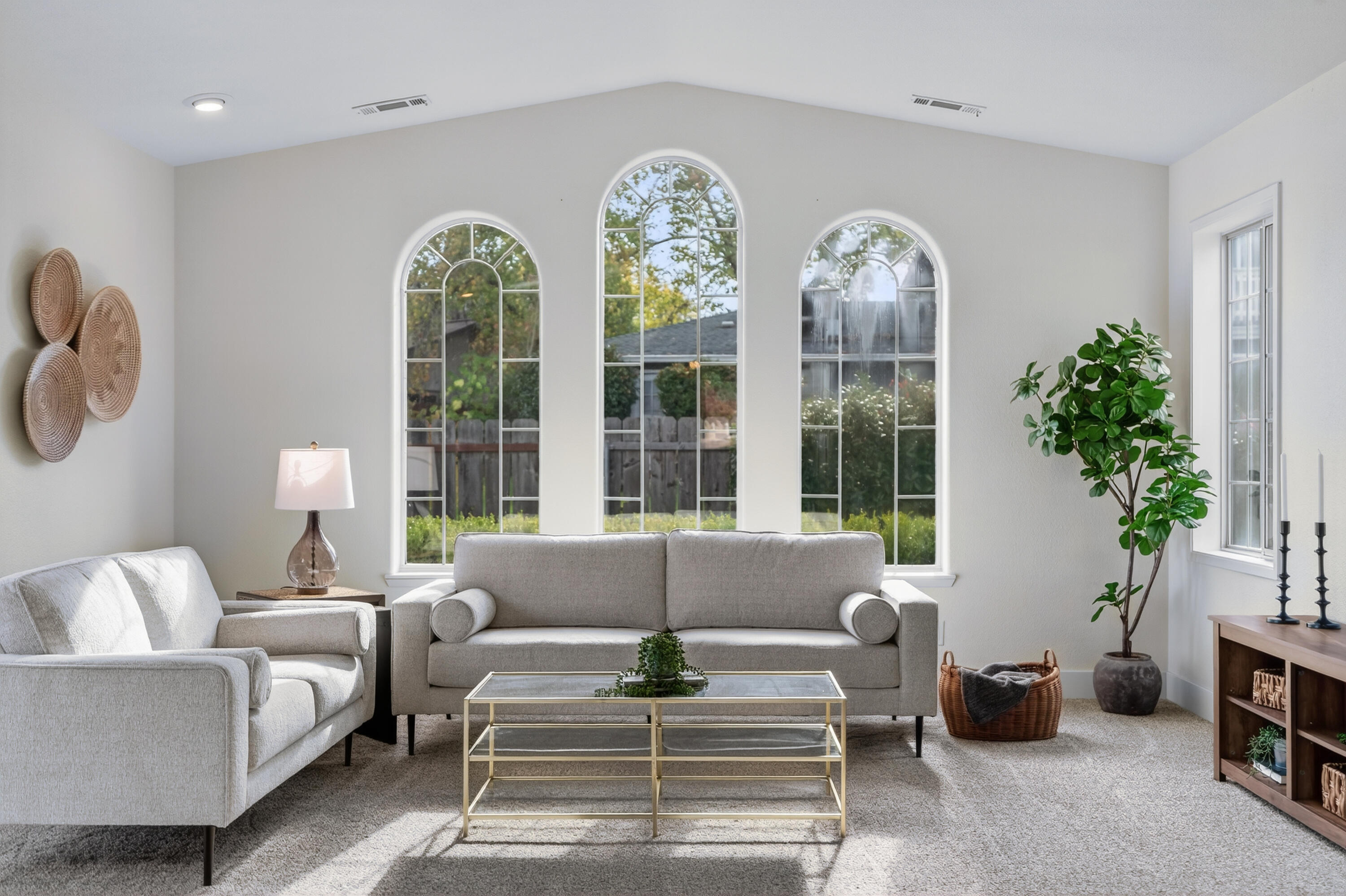595 Rafael Street Redding, CA 96002 - Photo 14 of 54 a living room with furniture a chandelier and a large window