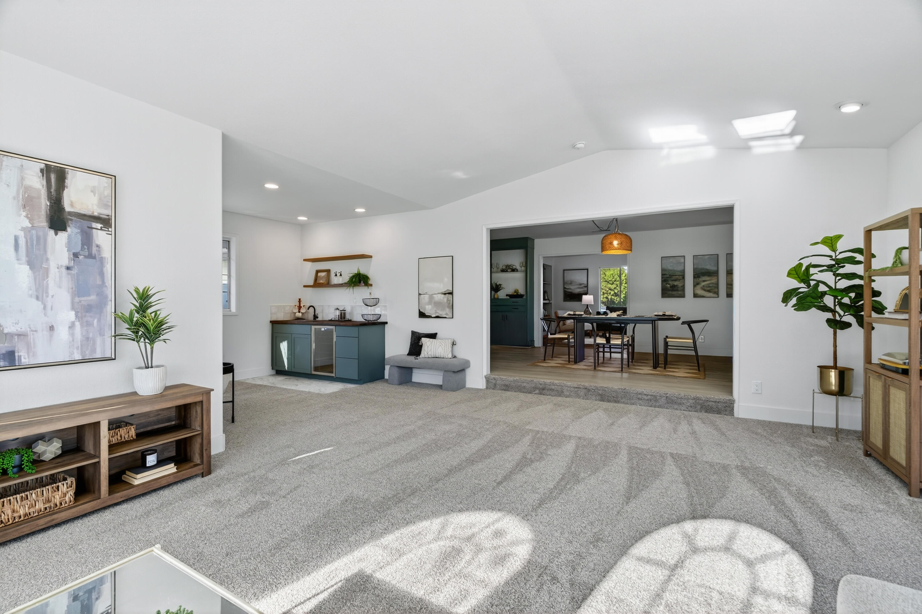 595 Rafael Street Redding, CA 96002 - Photo 16 of 54 a living room with furniture and potted plants