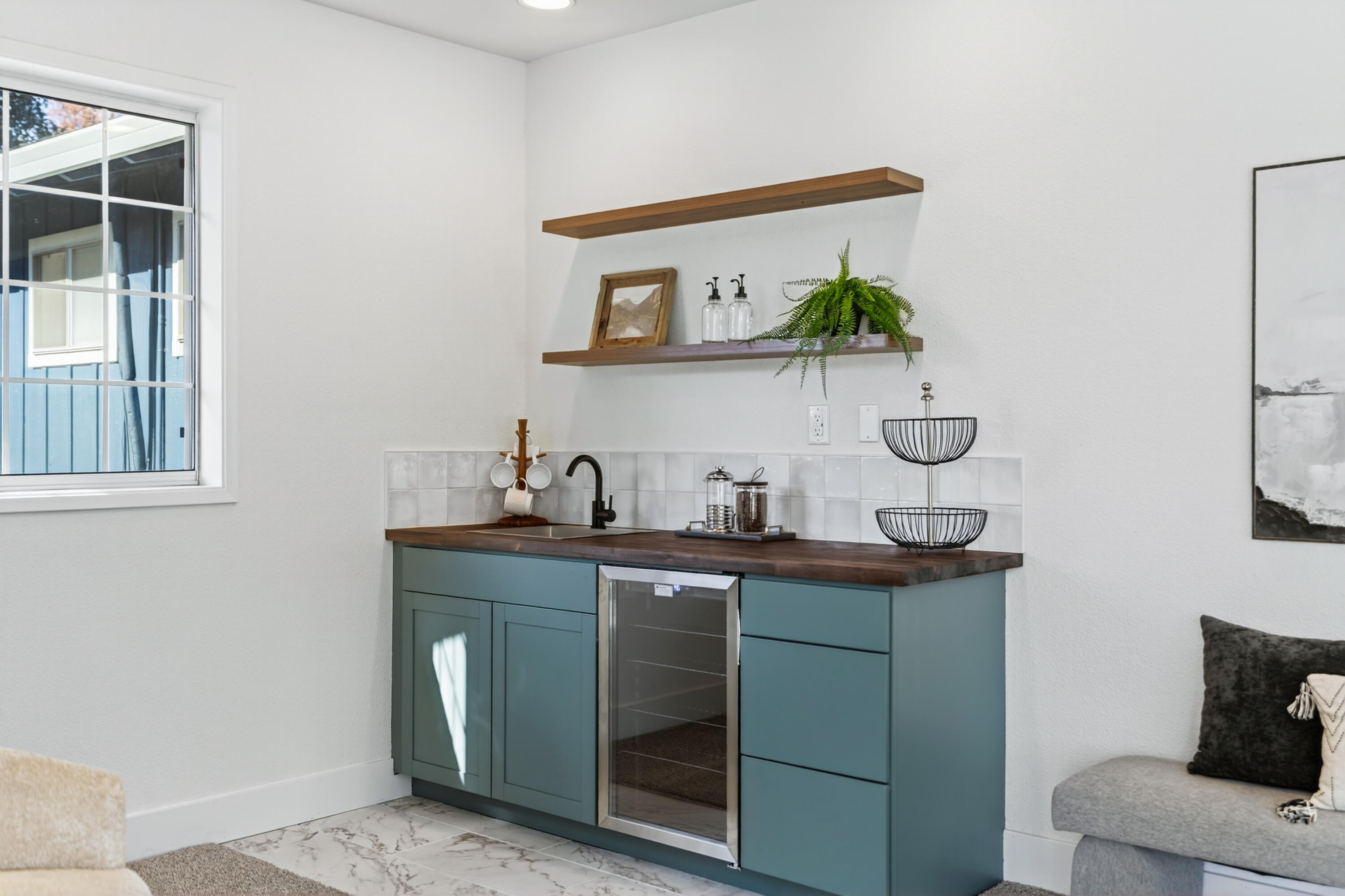 595 Rafael Street Redding, CA 96002 - Photo 18 of 54 a kitchen with stainless steel appliances a sink and a window