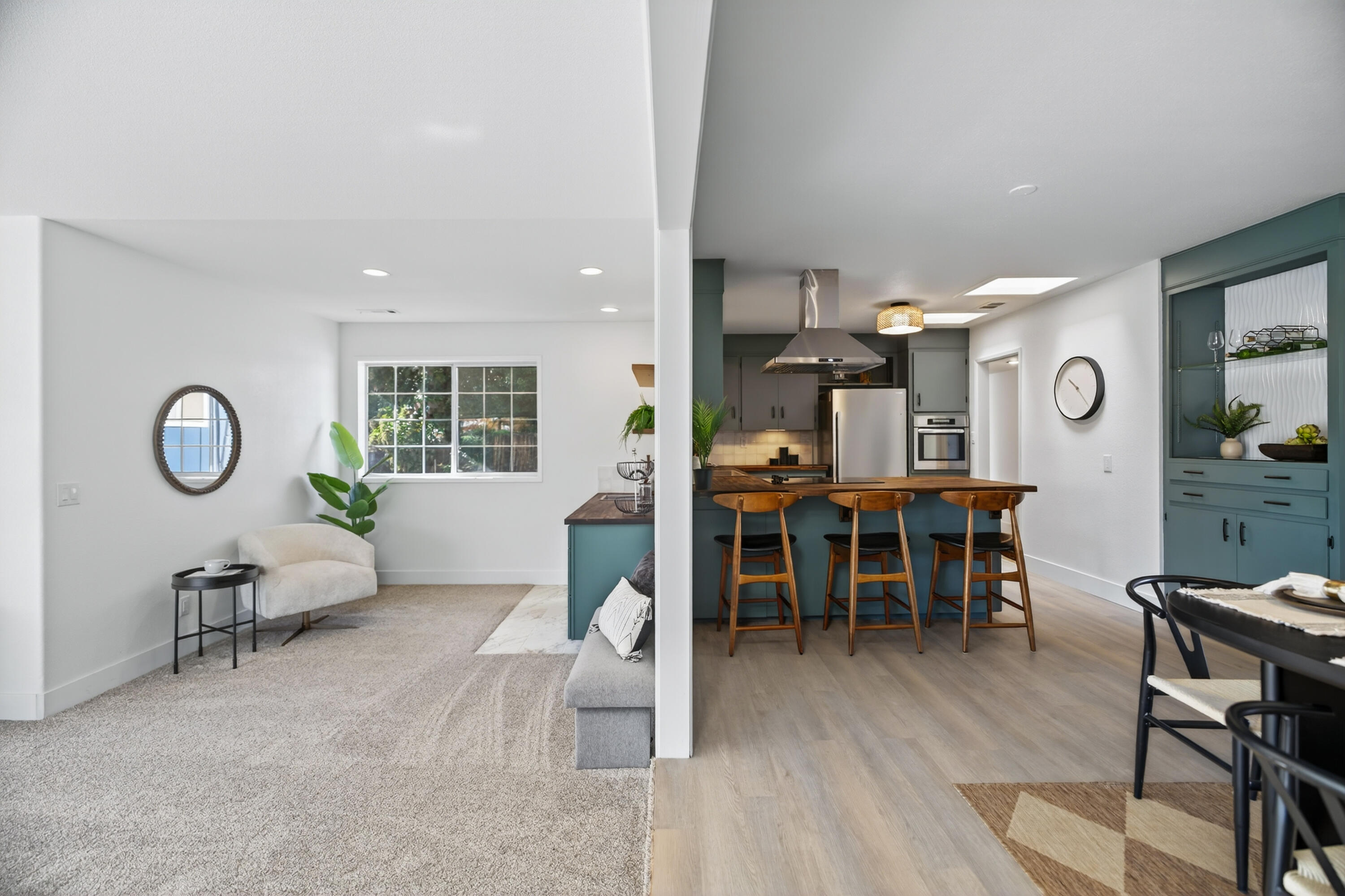 595 Rafael Street Redding, CA 96002 - Photo 20 of 54 a living room with furniture a dining table and wooden floor