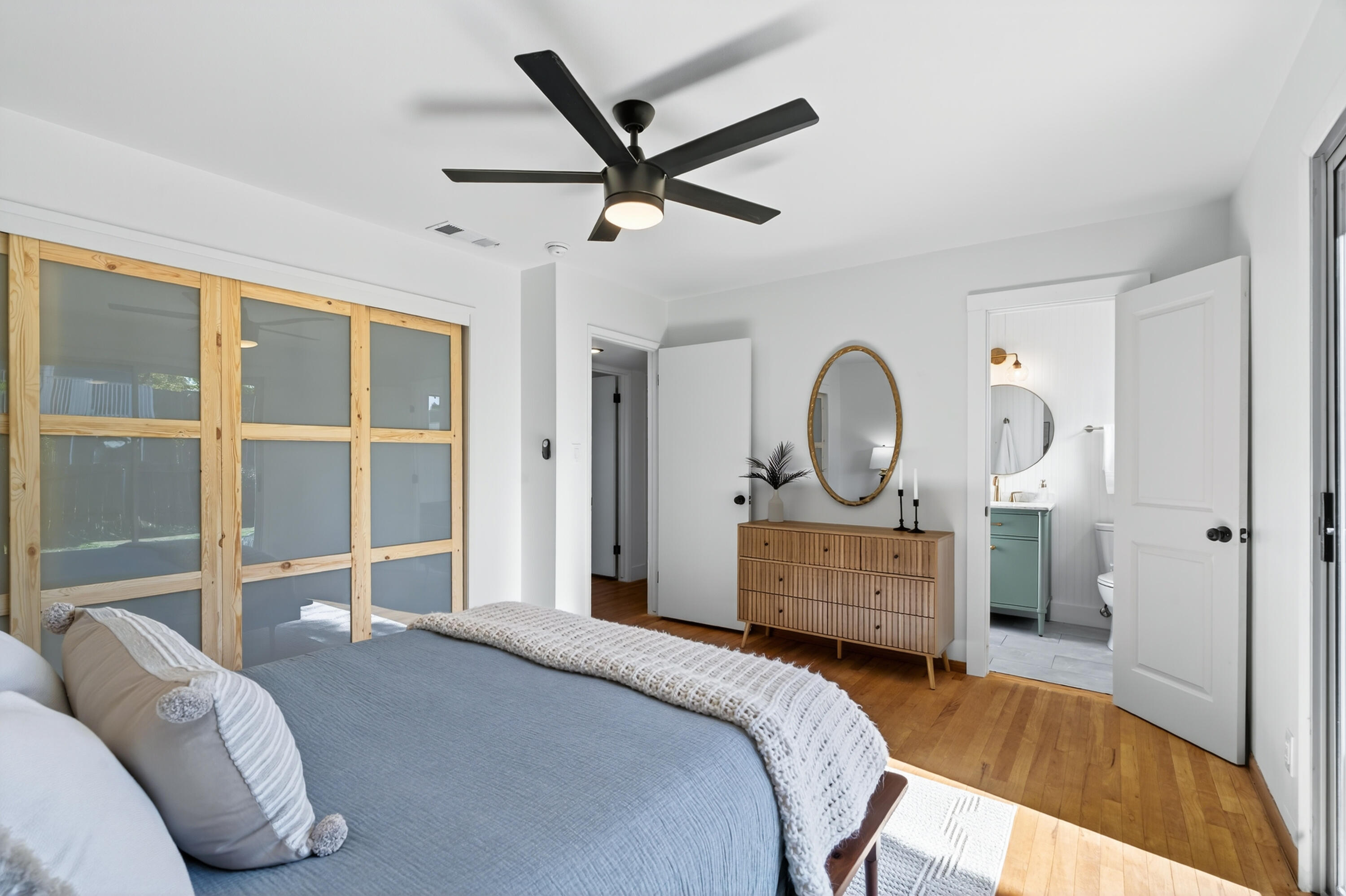 595 Rafael Street Redding, CA 96002 - Photo 33 of 54 a bedroom with a bed and a dresser next to a window