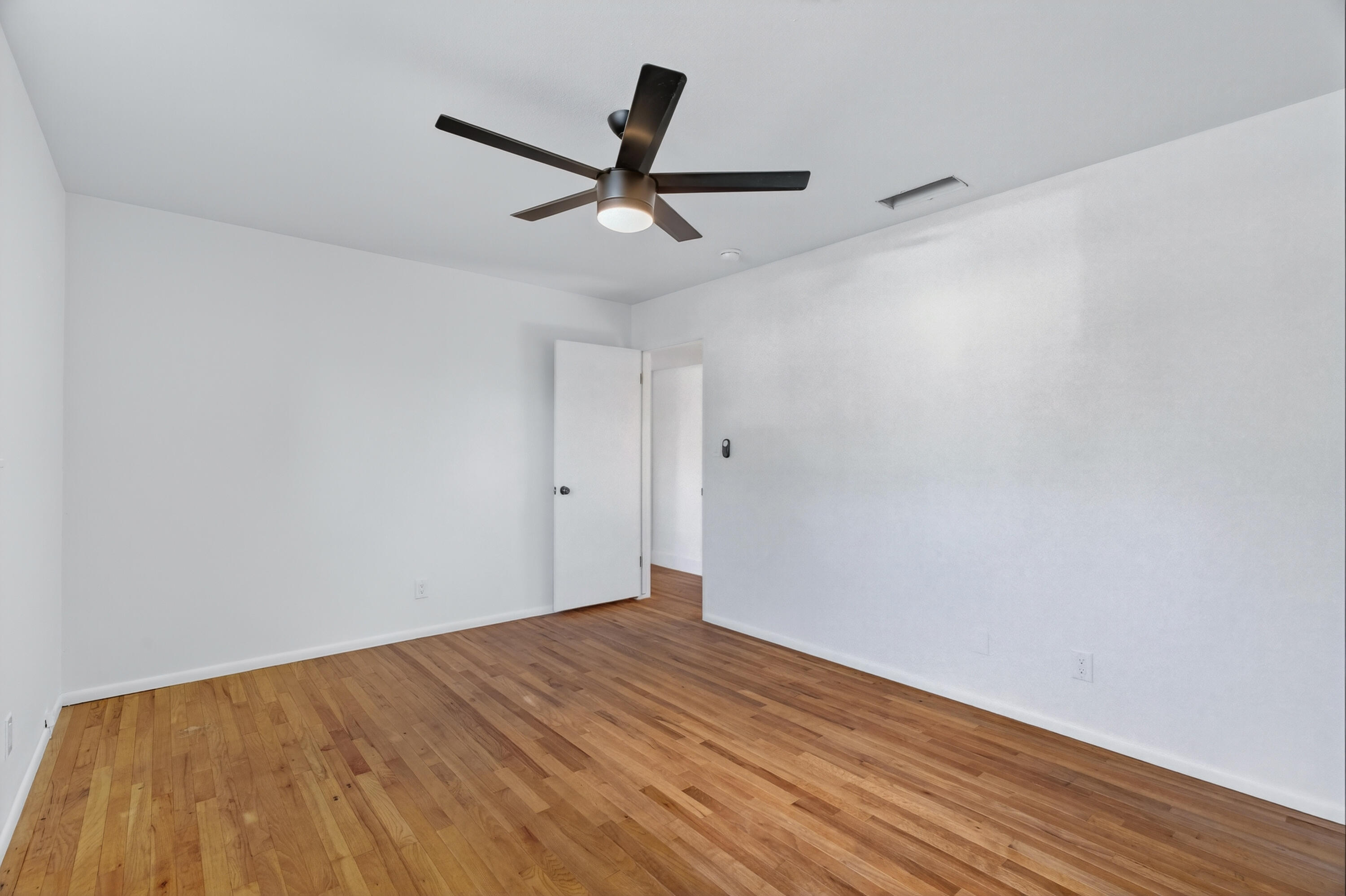 595 Rafael Street Redding, CA 96002 - Photo 39 of 54 a view of empty room with wooden floor