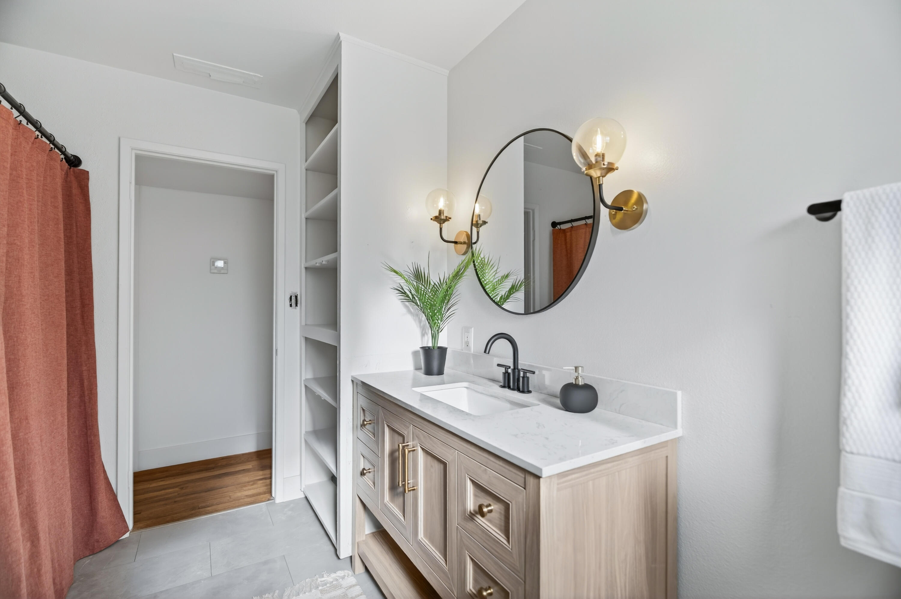 595 Rafael Street Redding, CA 96002 - Photo 42 of 54 a bathroom with a sink and a mirror