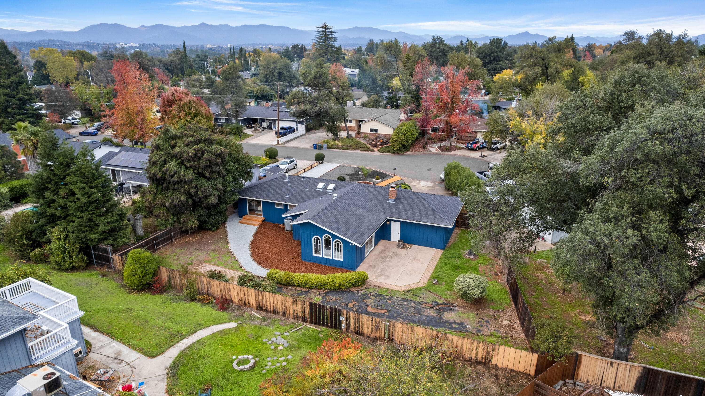 595 Rafael Street Redding, CA 96002 - Photo 54 of 54 an aerial view of a house with a yard and lake view