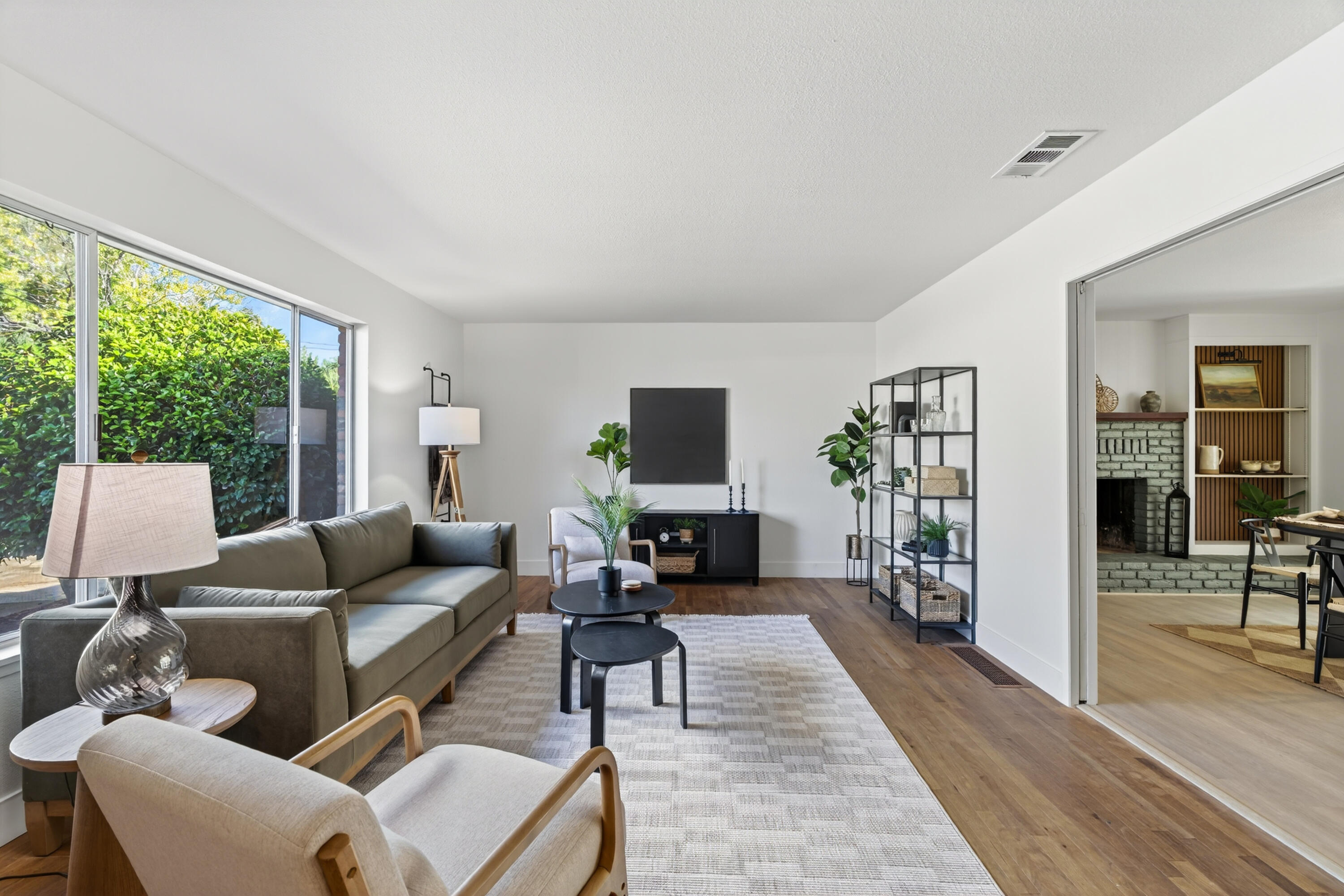 595 Rafael Street Redding, CA 96002 - Photo 10 of 54 a living room with furniture and a flat screen tv