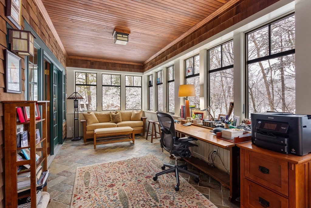 32 Standish Circle Wellesley, MA 02481 - Photo 13 of 41 a living room with furniture and a floor to ceiling window