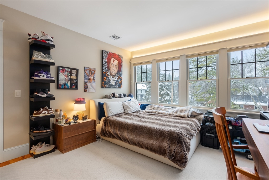 32 Standish Circle Wellesley, MA 02481 - Photo 18 of 41 a bed room with a bed and a large window