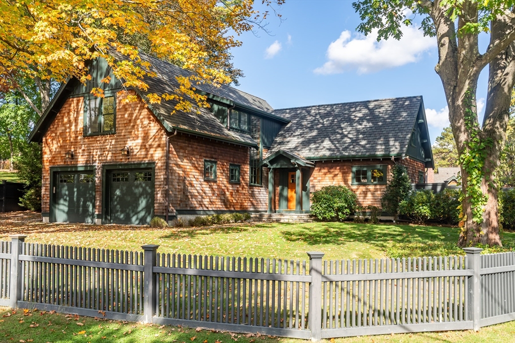 32 Standish Circle Wellesley, MA 02481 - Photo 24 of 41 a view of a house with a small yard and a large tree