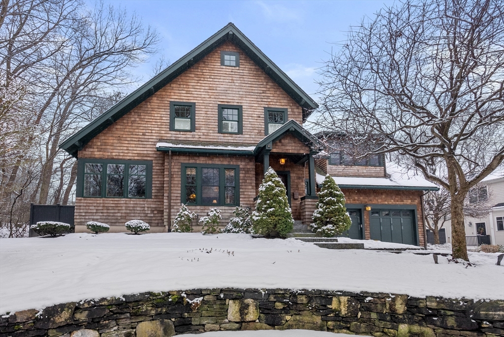32 Standish Circle Wellesley, MA 02481 - Photo 3 of 41 a front view of a house with a snow in front of house