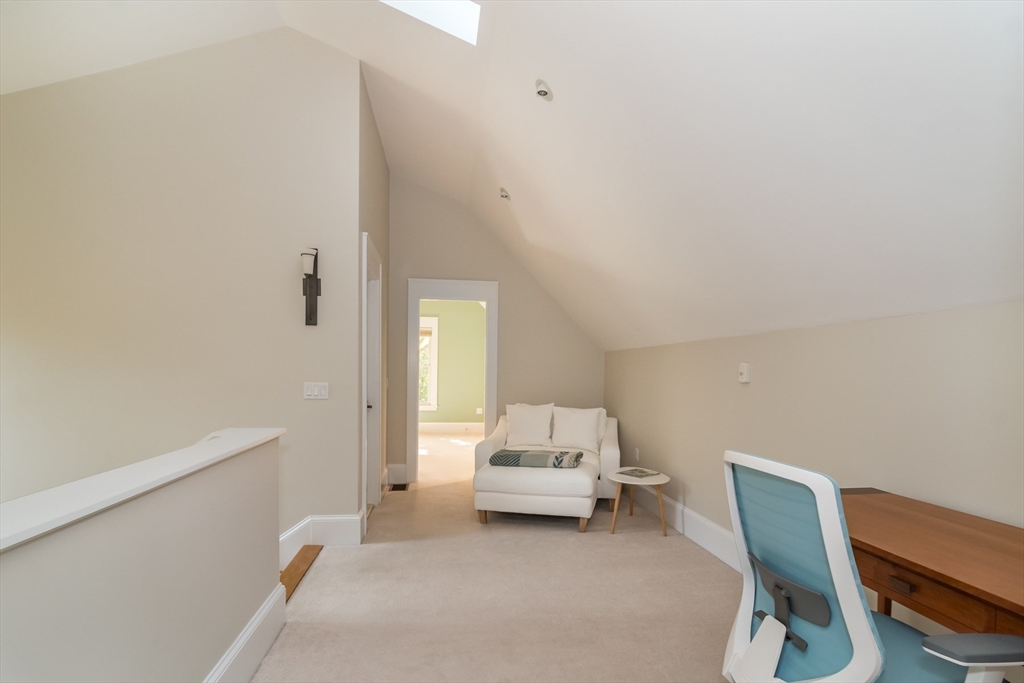 32 Standish Circle Wellesley, MA 02481 - Photo 35 of 41 a bedroom with a bed and a chair