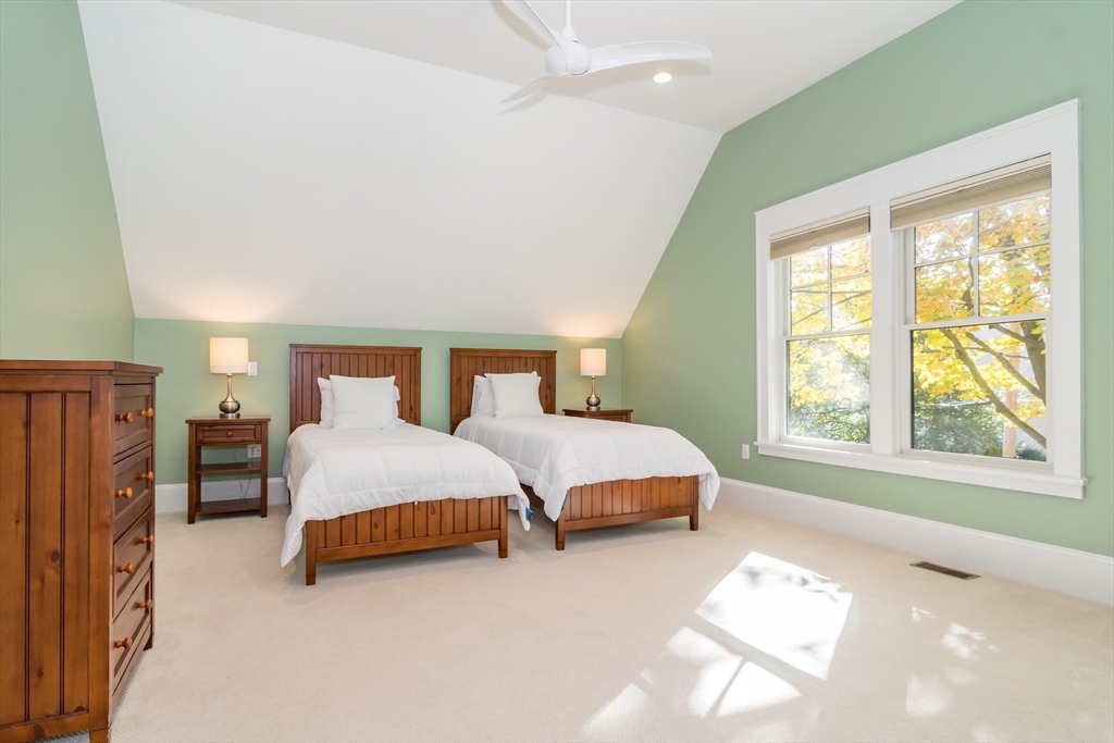 32 Standish Circle Wellesley, MA 02481 - Photo 37 of 41 a bedroom with a bed and a large window