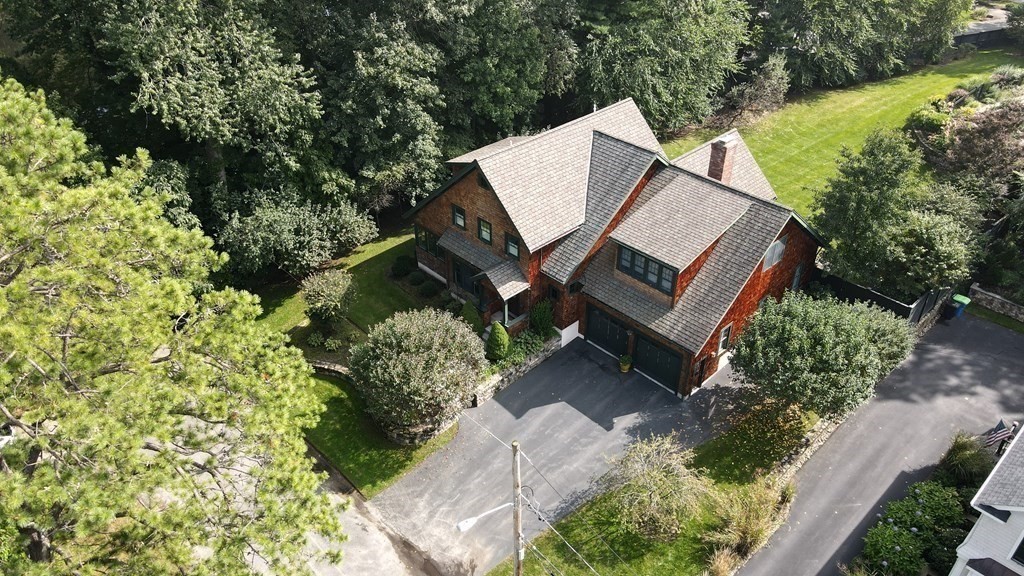 32 Standish Circle Wellesley, MA 02481 - Photo 4 of 41 an aerial view of a house with a yard and covered with trees