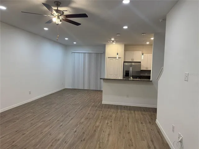 a view of a kitchen with a sink and a microwave