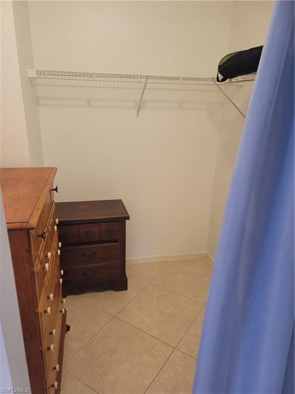 7731 Jewel Lane, Unit 204 Naples, FL 34109 - Photo 16 of 29 a room with storage and utility