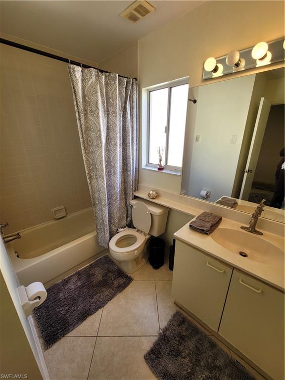 7731 Jewel Lane, Unit 204 Naples, FL 34109 - Photo 20 of 29 a bathroom with a sink toilet and shower