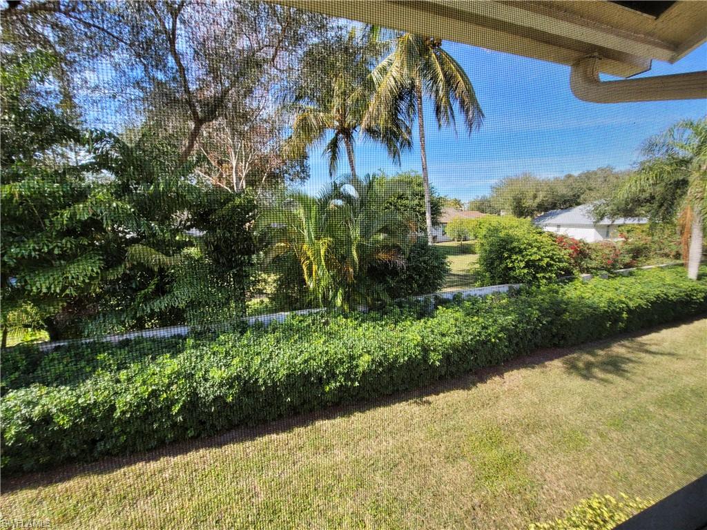 7731 Jewel Lane, Unit 204 Naples, FL 34109 - Photo 24 of 29 a view of a garden