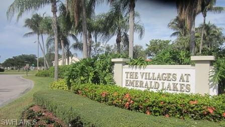 7731 Jewel Lane, Unit 204 Naples, FL 34109 - Photo 27 of 29 a view of outdoor space with garden