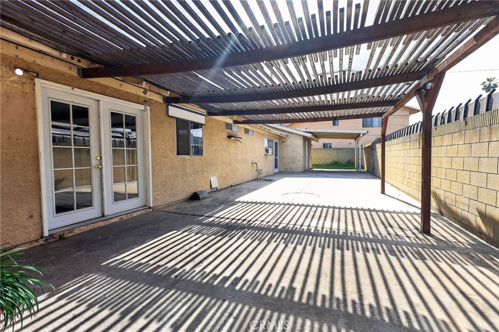 404 South 3rd Street Montebello, CA 90640 - Photo 24 of 29 a view of backyard with wooden roof