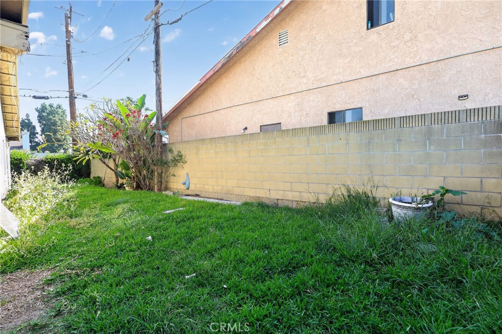 404 South 3rd Street Montebello, CA 90640 - Photo 27 of 29 a view of a backyard with potted plants
