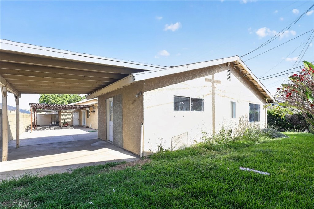 404 South 3rd Street Montebello, CA 90640 - Photo 28 of 29 a front view of a house with a yard