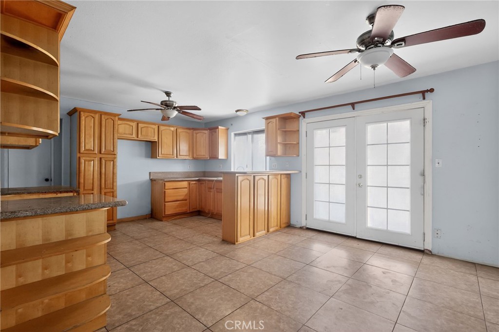 404 South 3rd Street Montebello, CA 90640 - Photo 6 of 29 a view of a kitchen with a sink and a refrigerator