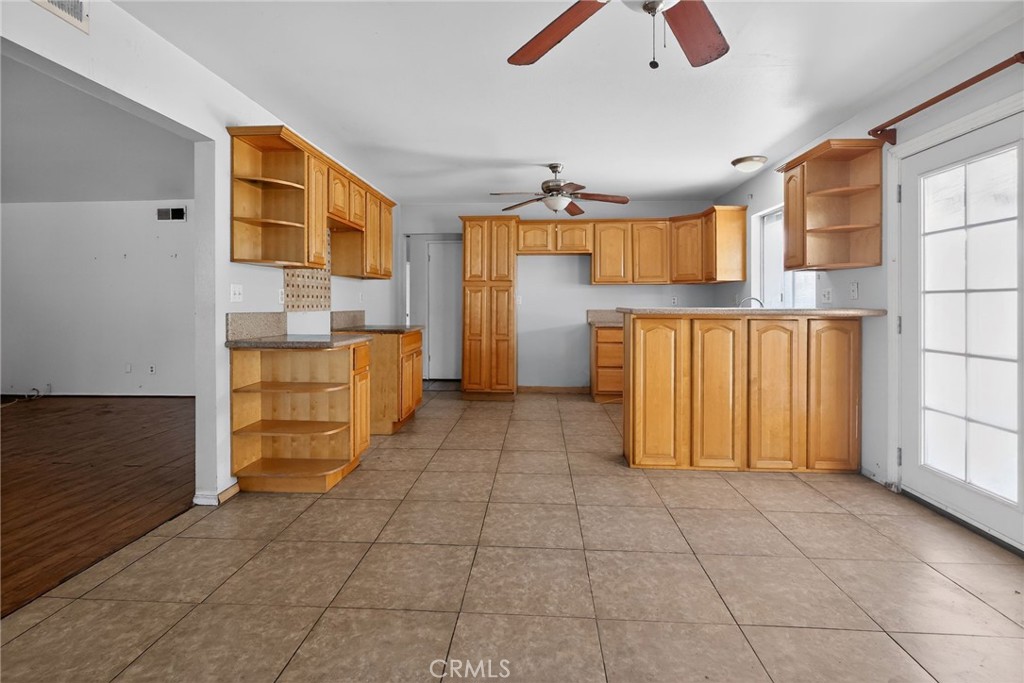 404 South 3rd Street Montebello, CA 90640 - Photo 8 of 29 a view of kitchen with furniture and window