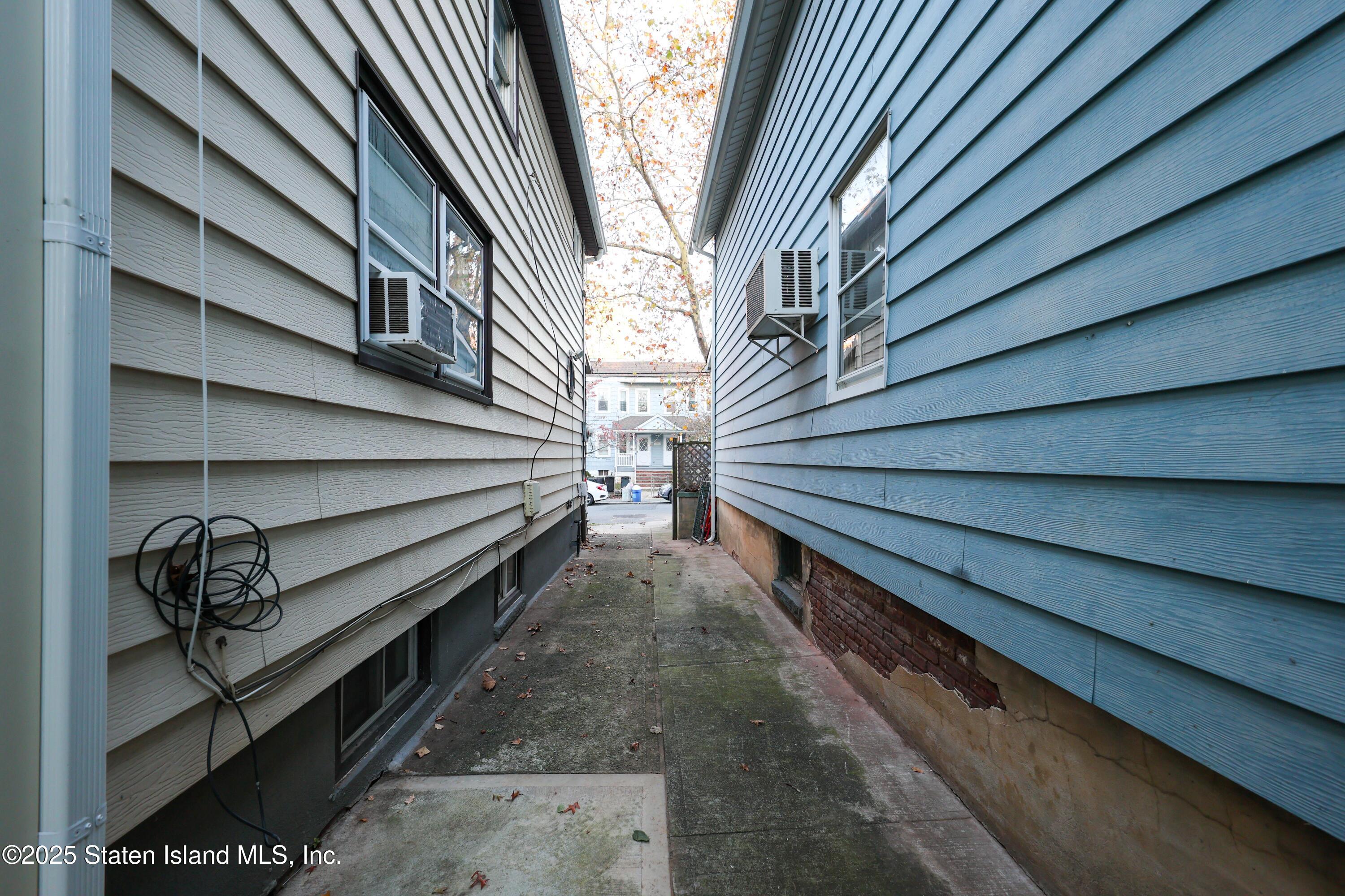 76 Simonson Avenue Staten Island, NY 10303 - Photo 18 of 21 a view of a pathway in a house