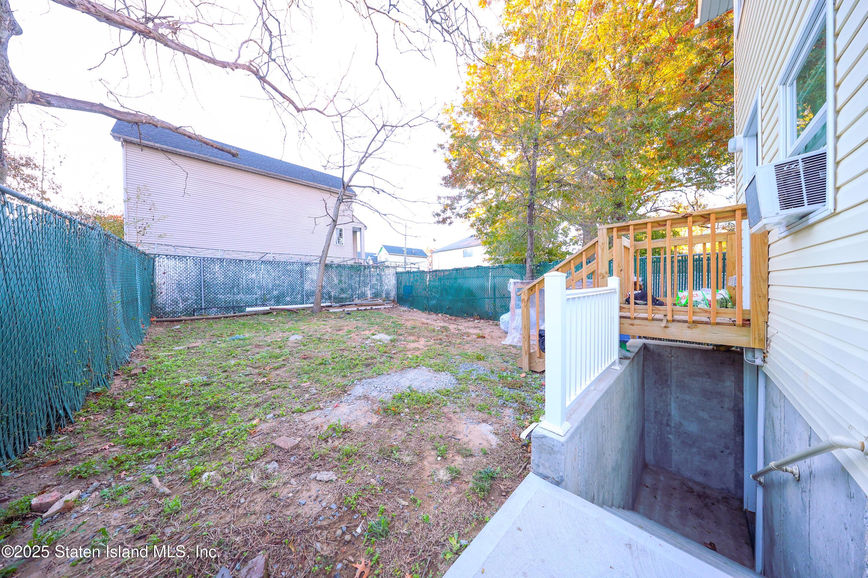 76 Simonson Avenue Staten Island, NY 10303 - Photo 21 of 21 a view of a house with a yard