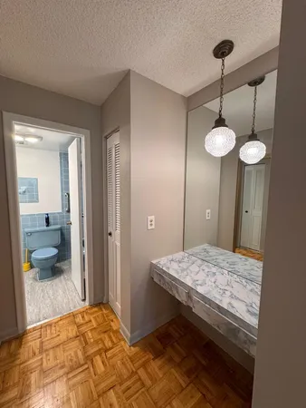 a bathroom with a toilet and a sink