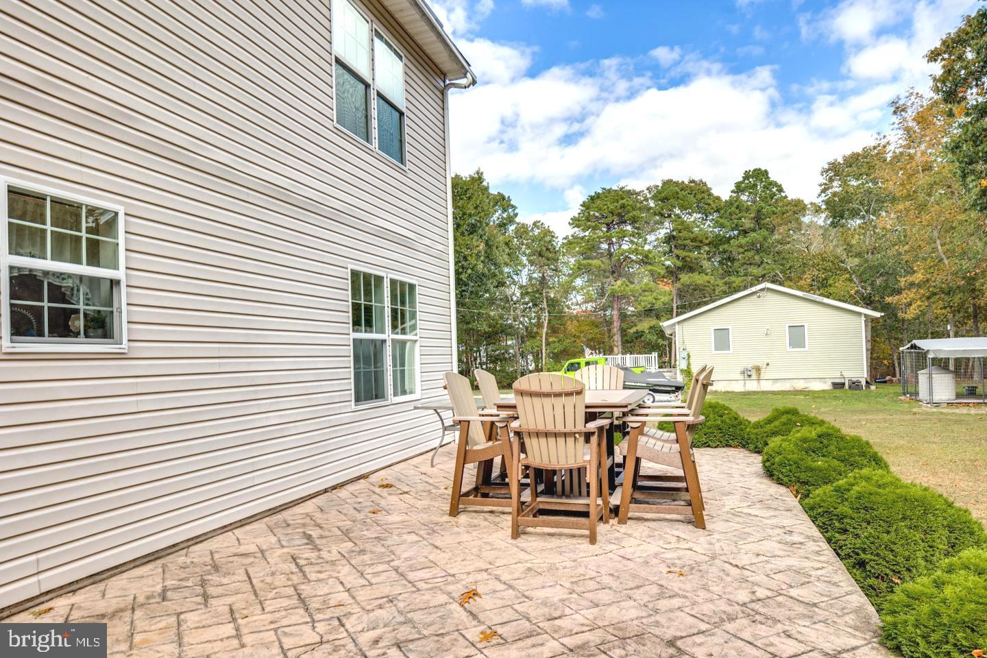 33 Laurel Road Millville, NJ 08332 - Photo 29 of 37 a view of a house with backyard and a sitting area