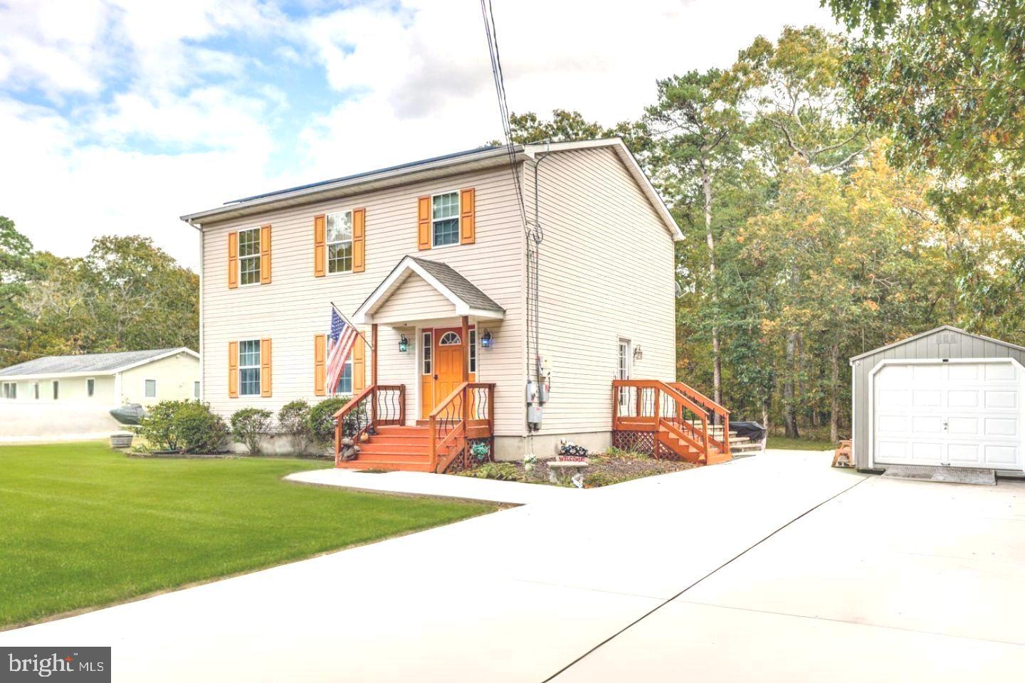 33 Laurel Road Millville, NJ 08332 - Photo 3 of 37 a view of a house with yard and sitting area