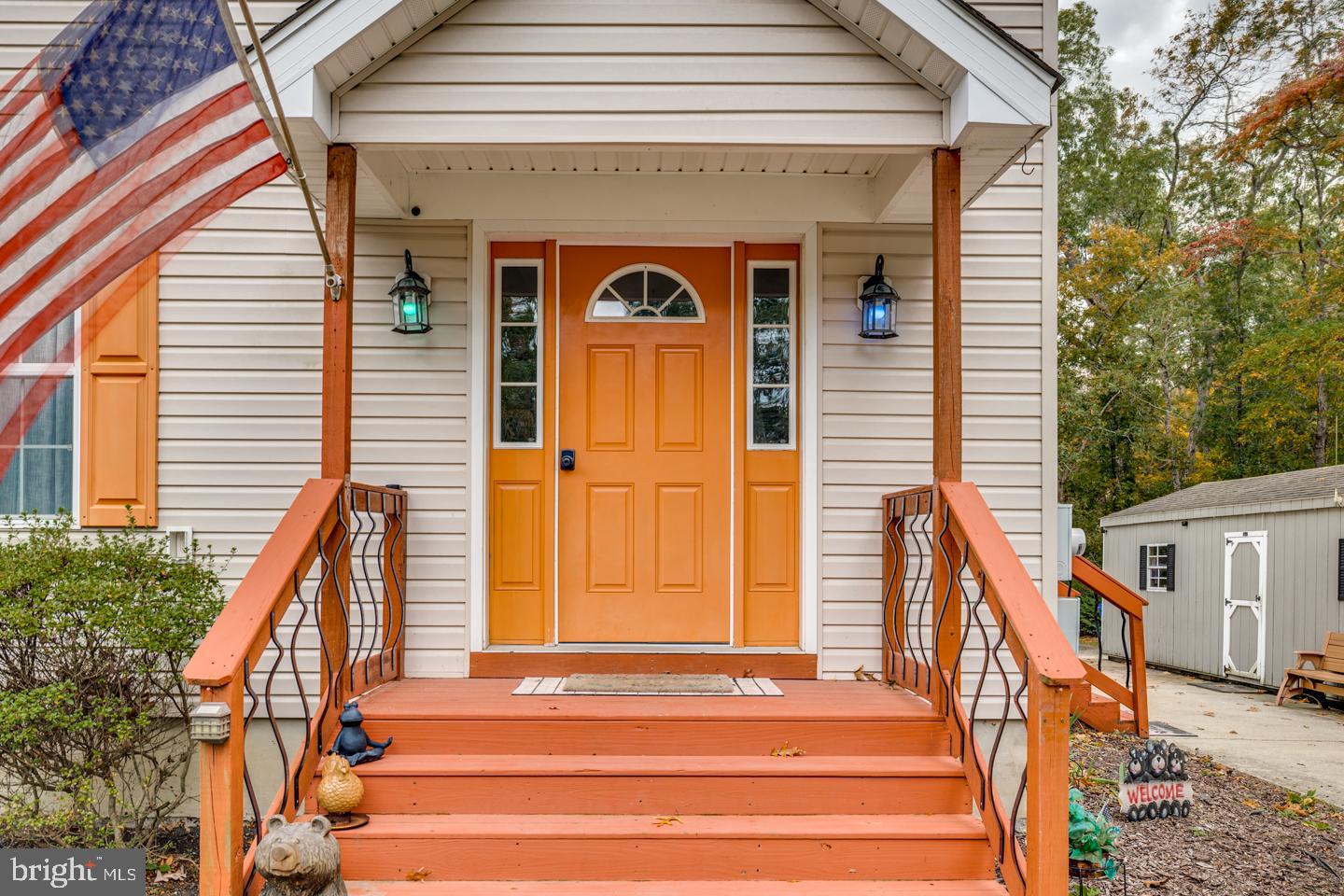 33 Laurel Road Millville, NJ 08332 - Photo 4 of 37 a front view of a house with a iron stairs