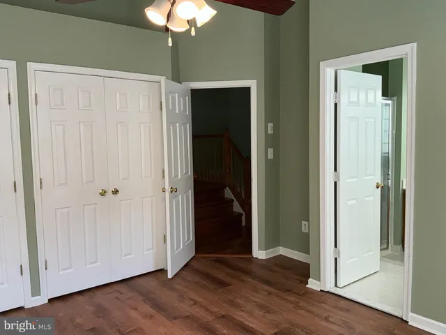 a view of entryway with wooden floor