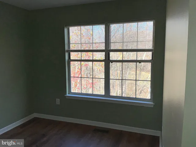 a view of a room that has a window in it