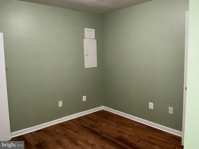 an empty room and wooden floor