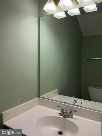 a bathroom with a sink and a vanity