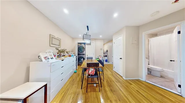 a very nice looking room with a large bed a desk and chair