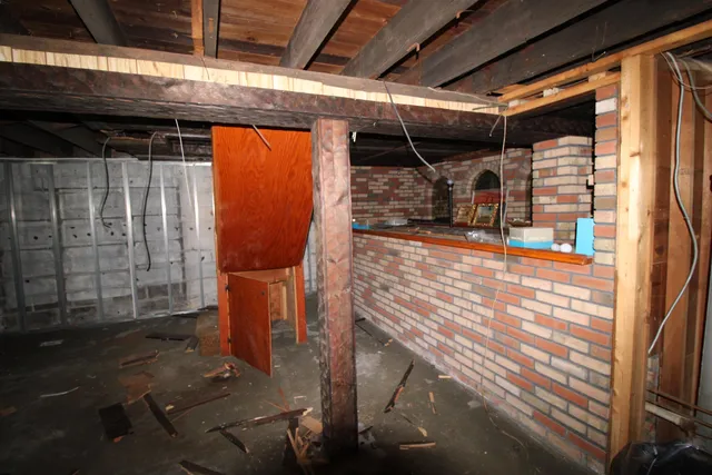 a view of a backyard of the house