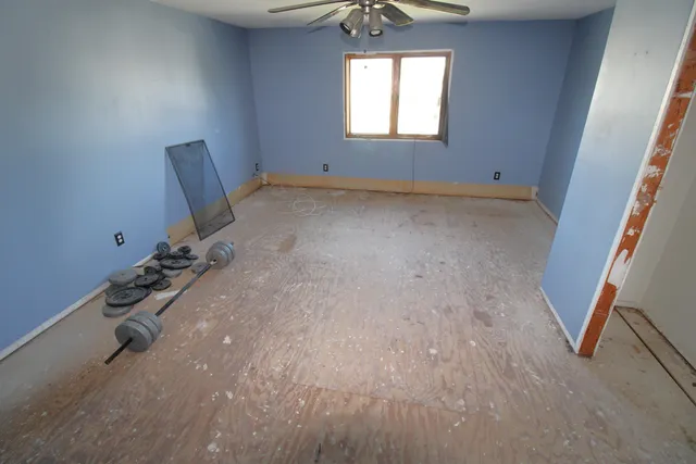 an empty room with windows