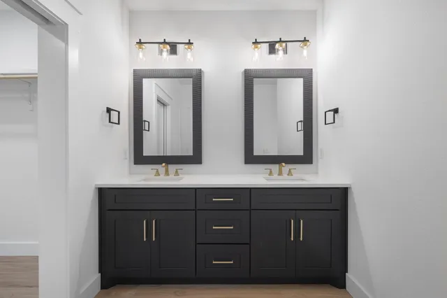 a white bath tub sitting in a bathroom