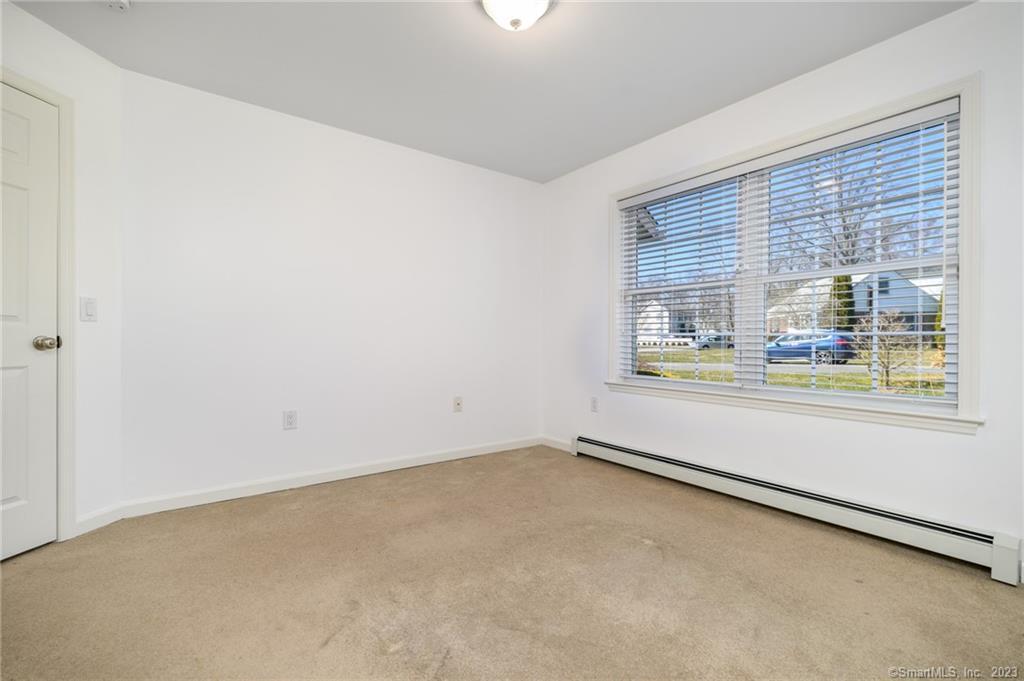 217 Highlawn Road Fairfield, CT 06824 - Photo 17 of 27 an empty room with window