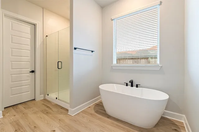 a bathroom with a granite countertop sink mirror and