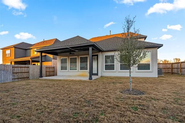 a view of a backyard of a house