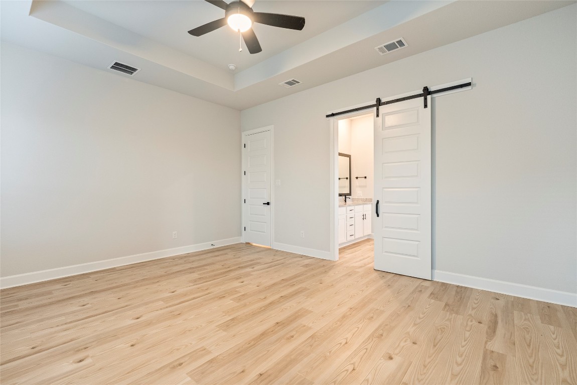 17113 Howdy Way Manor, TX 78653 - Photo 7 of 25 wooden floor in an empty room