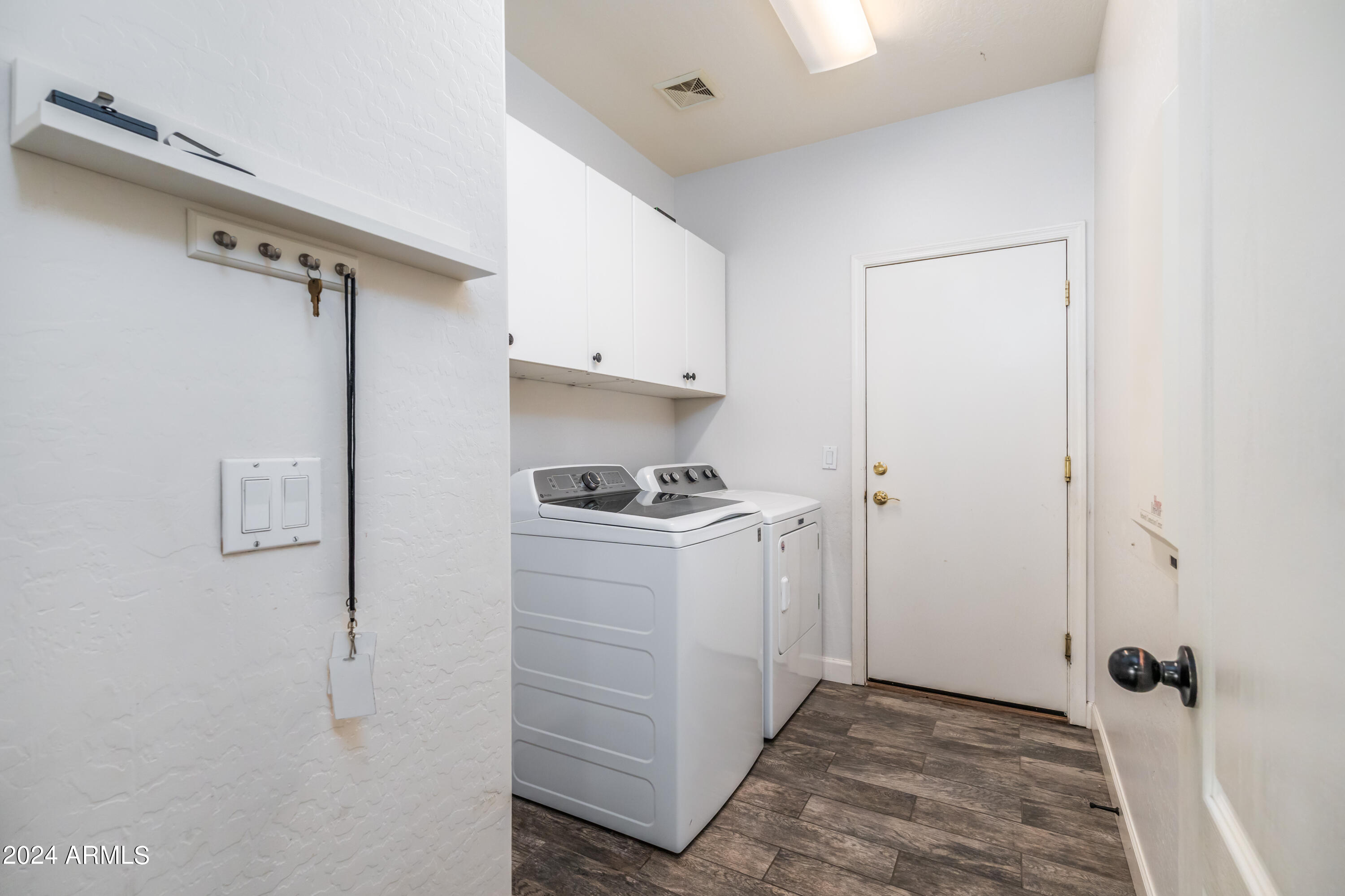 4024 East Reins Road Gilbert, AZ 85297 - Photo 27 of 85 6b laundry room to garage