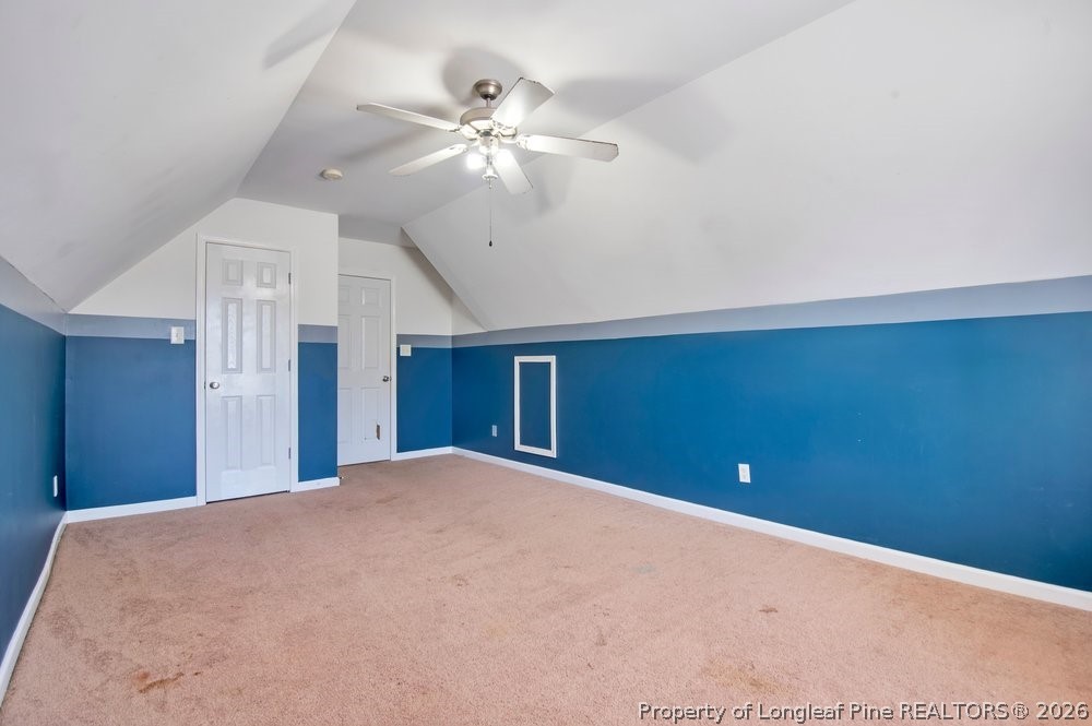 10 Pender Road Spring Lake, NC 28390 - Photo 15 of 35 a view of a livingroom with a ceiling fan and entryway