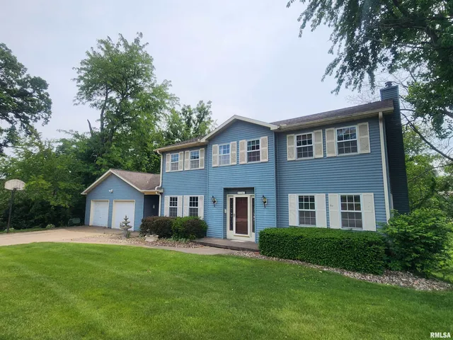 $300,000 | 591 Breezy Point Drive, Clinton, IA 52732