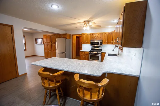 $300,000 | 591 Breezy Point Drive, Clinton, IA 52732