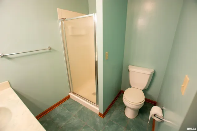 $300,000 | 591 Breezy Point Drive, Clinton, IA 52732